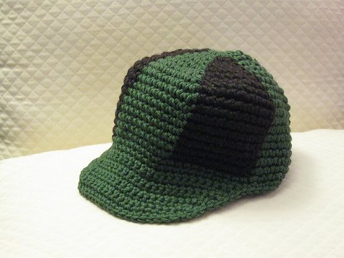 Boy's Baseball Cap — a crocheted green and black baby baseball cap